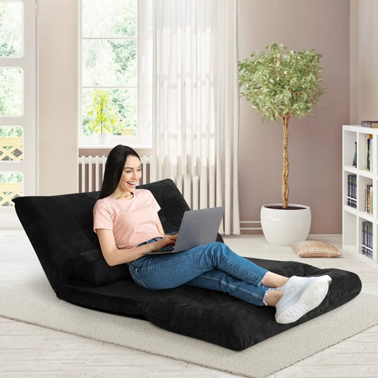 Six-Position Adjustable Sleeper Couch by DirectDeals in black upholstery with person on laptop on Tampa Home & Garden Store