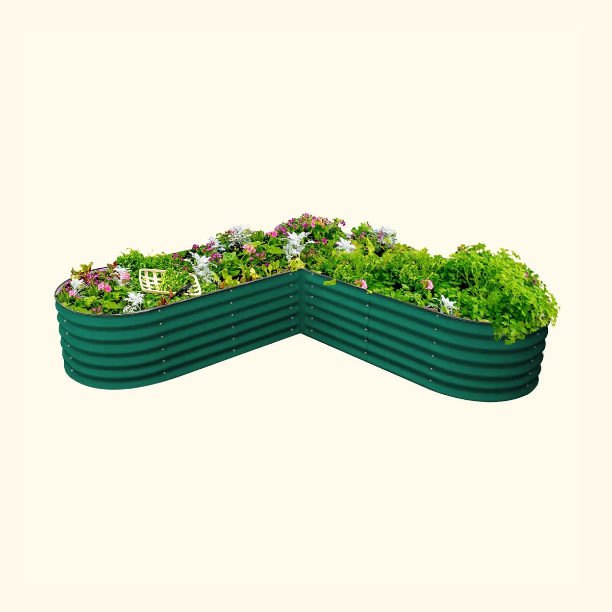 L-shaped raised garden bed with flowering plants, green sides, soil and fertilizer kit on Tampa Home & Garden Store