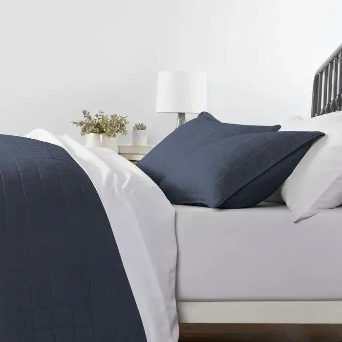 Farmhouse microfiber coverlet set Navy with 2 shams on bed on Tampa Home & Garden Store