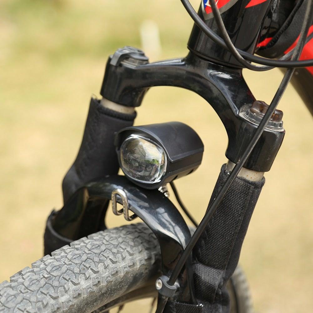 2-in-1 bike front light and horn mounted on black front fork with LED lamp, rugged housing on Tampa Home & Garden Store