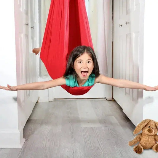 Kids indoor sensory swing hammock cocoon seat in red fabric by Moktan Sabai for playroom on Tampa Home & Garden Store