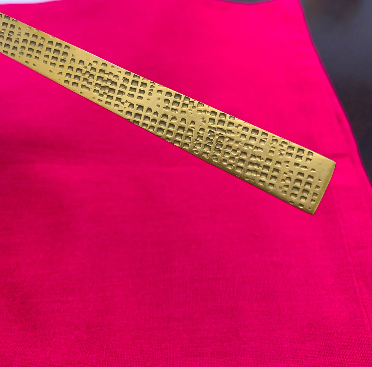 Vibhsa gold flatware strip with square-grid perforated pattern on Tampa Home & Garden Store