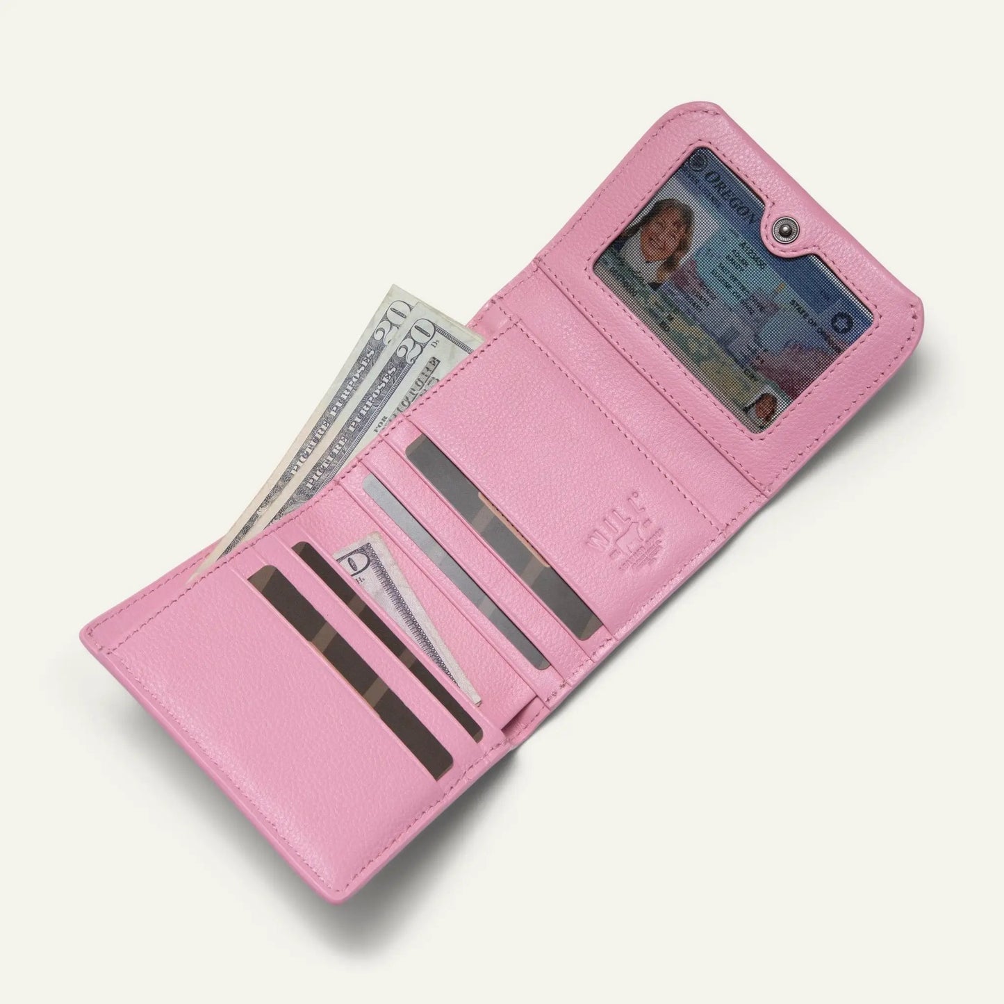 Pink Will Leather Goods wallet with tan leather trim, transparent ID window and card slots on Tampa Home & Garden Store
