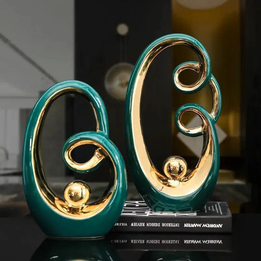 White Pottery Modern Minimalist TV Cabinet teal and gold ceramic sculpture pair on book stack on Tampa Home & Garden Store