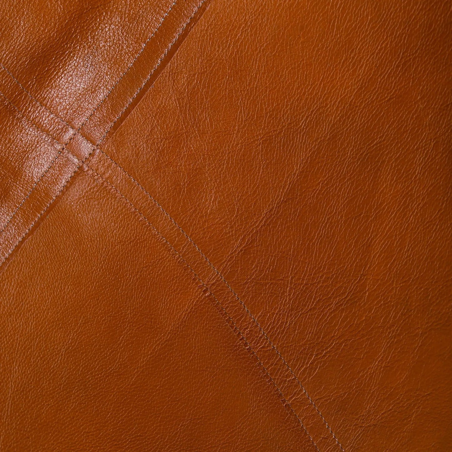 Vintage real leather butterfly chair upholstery in warm tan brown with diagonal stitched panels on Tampa Home & Garden Store