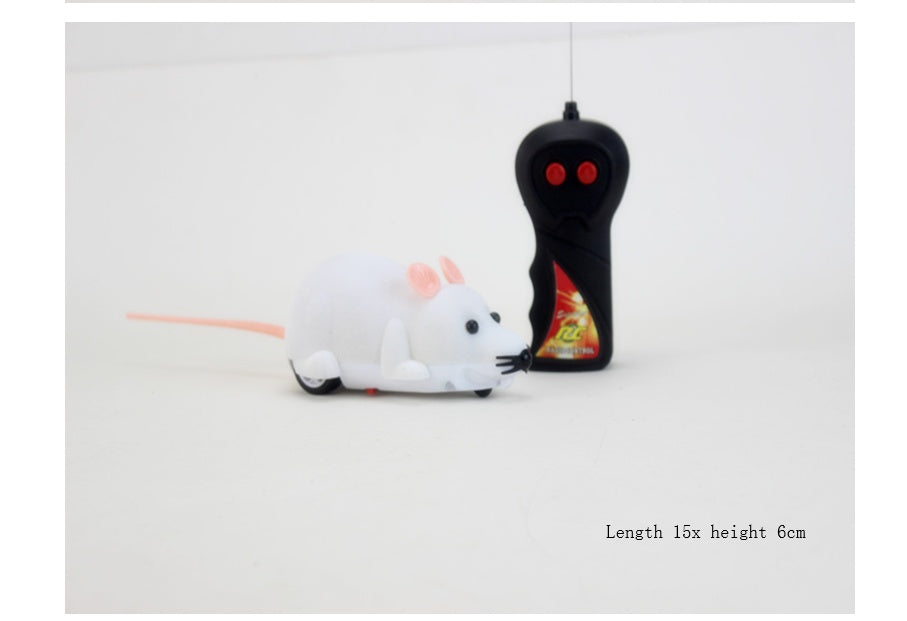 RC mouse toy with white flocking, pink ears, and black remote transmitter by Sell My Stuff on Tampa Home & Garden Store