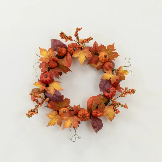 Autumn maple leaves wreath with orange and red leaves, berries and small pumpkins on Tampa Home & Garden Store