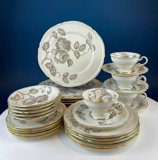 Castleton Gloria 24-Piece porcelain dinner set with gray rose pattern and gold trim on Tampa Home & Garden Store