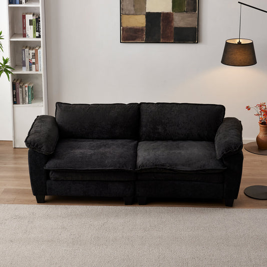 Black chenille loveseat sofa with plush cushions, large luxury couch in a cozy living room on Tampa Home & Garden Store