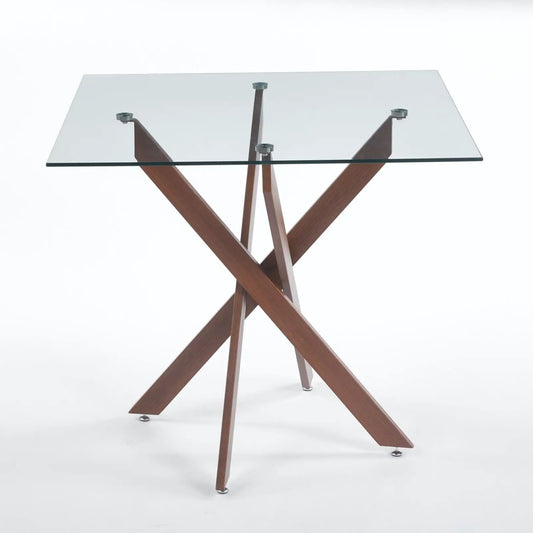 Dining table with square tempered glass top and crisscross wooden legs, modern space-saving design on Tampa Home & Garden Store