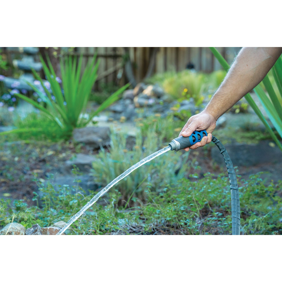 Orbit Irrigation Elevated 100 Feet Heavy Duty Fabric Garden Hose with blue ergonomic nozzle on Tampa Home & Garden Store