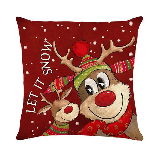 Christmas pillow cover linen print red background with cartoon reindeer, scarf and hat and Let It Snow text on Tampa Home & Garden Store