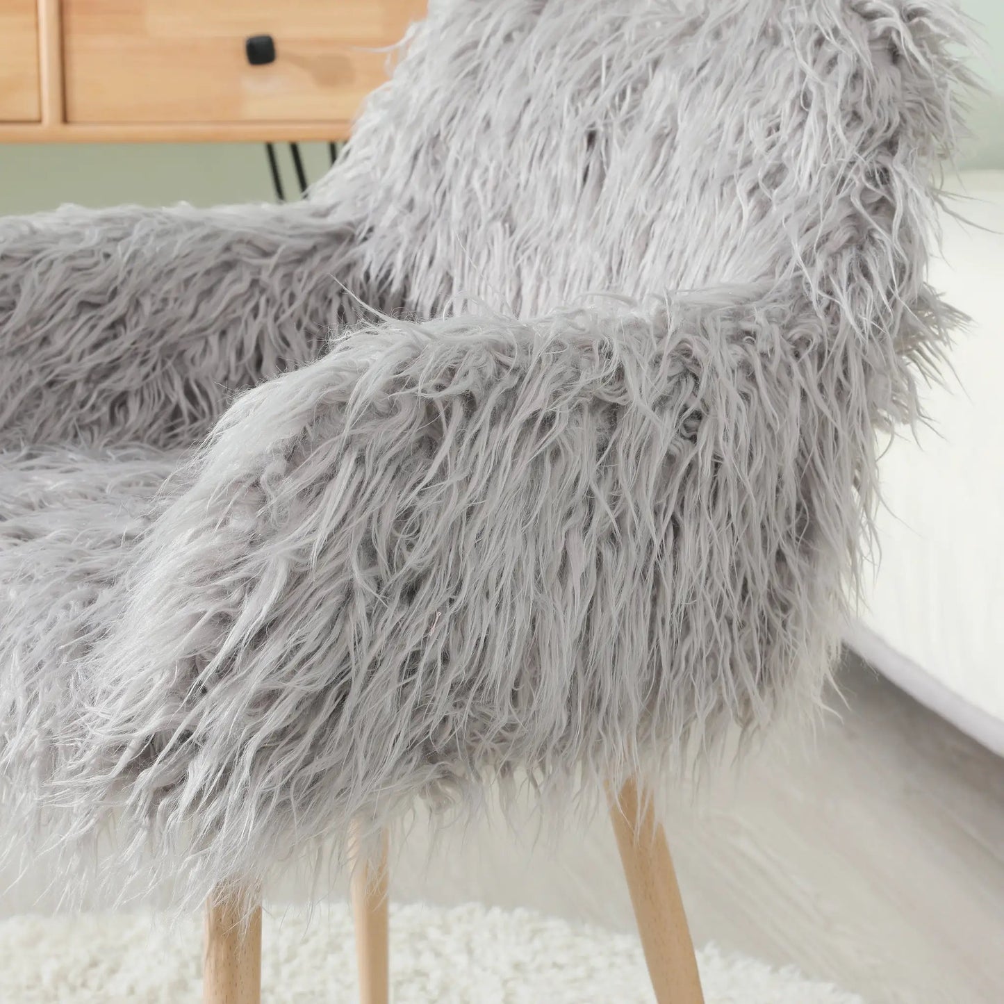 Grey faux fur upholstered makeup chair with wooden legs on Tampa Home & Garden Store