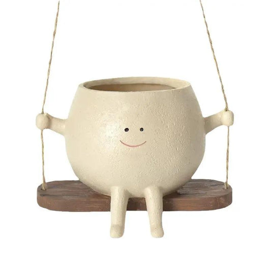 Swing Face Resin Wall Hanging Head Planter in cream with a smiling face on a swing on Tampa Home & Garden Store