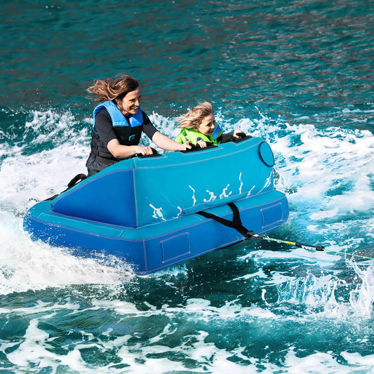 Two-person blue inflatable towable tube for boating with riders in life jackets on Tampa Home & Garden Store