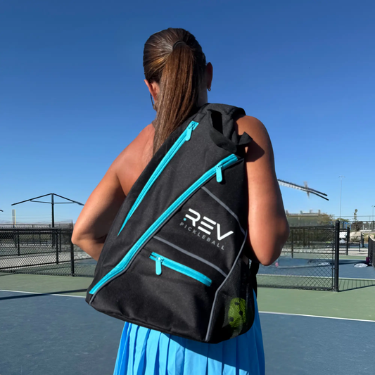 Elite Paddle Bag for Pickleball Gear black bag with teal zippers and REV Pickleball branding on Tampa Home & Garden Store