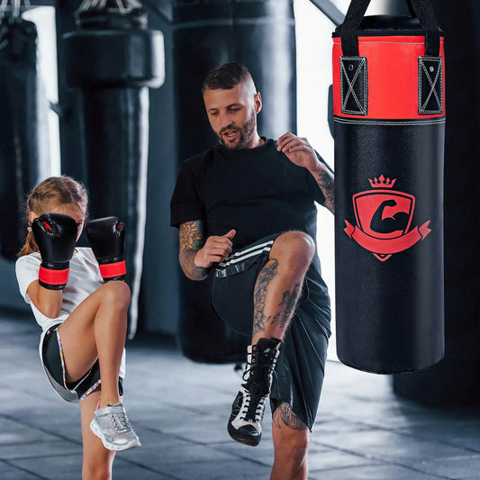 Kids hanging punching bag set with gloves, 11 lb black and red bag in gym on Tampa Home & Garden Store