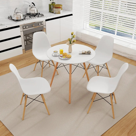 Five-piece dining set with solid wood legs; round white table and four white molded chairs on Tampa Home & Garden Store