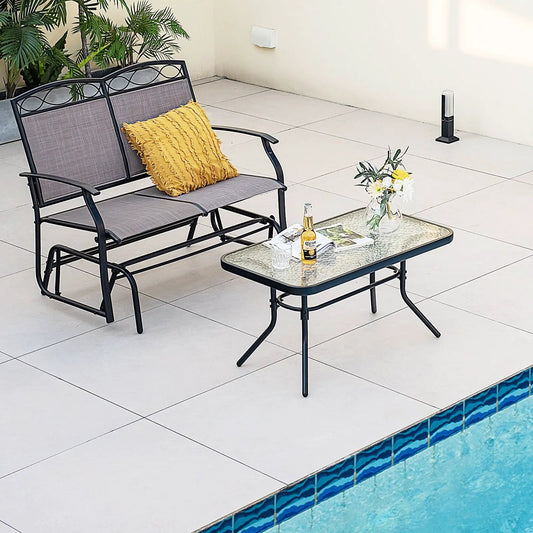 Outdoor gliding loveseat and tempered glass coffee table 2-piece set with gray cushions on Tampa Home & Garden Store