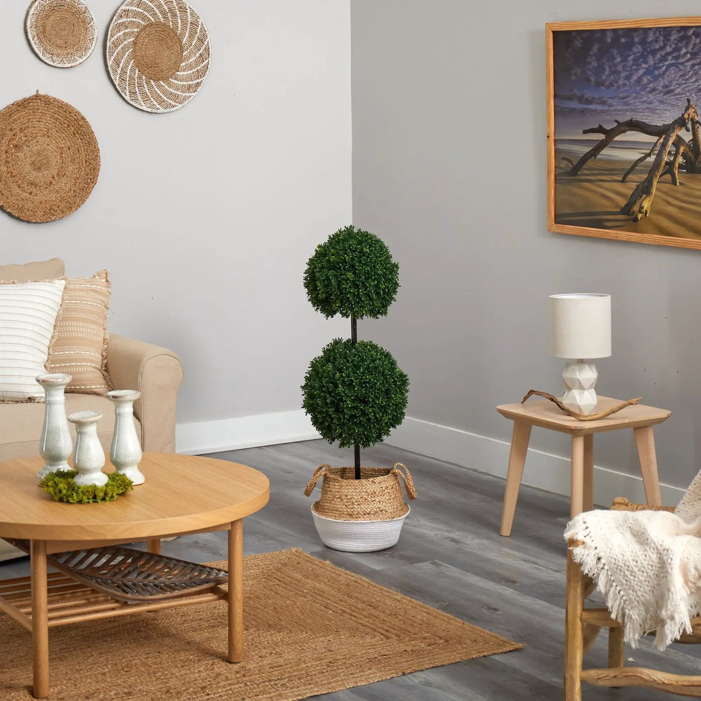Boxwood double-ball topiary trees in boho natural-fiber planters on Tampa Home & Garden Store