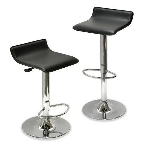 Two black bar stools with chrome pedestal bases and circular footrests, HomePacific on Tampa Home & Garden Store