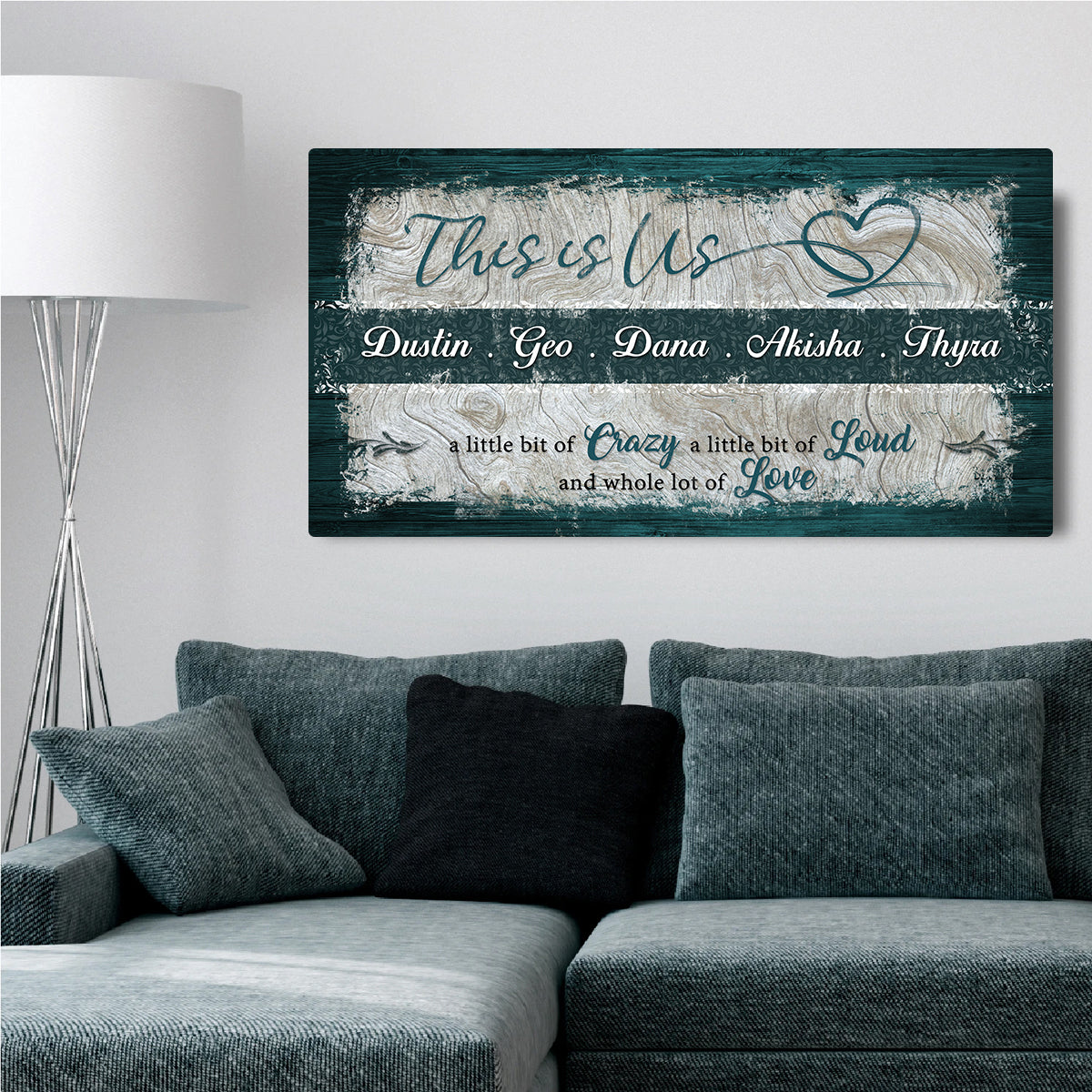 This is Us Family Sign canvas with teal distressed wood and cursive names Tailored Canvases on Tampa Home & Garden Store