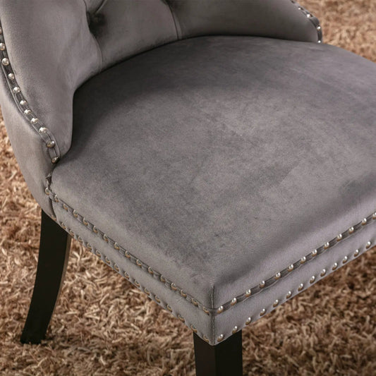 Gray velvet dining chair with nailhead trim and studded edge, black legs on Tampa Home & Garden Store