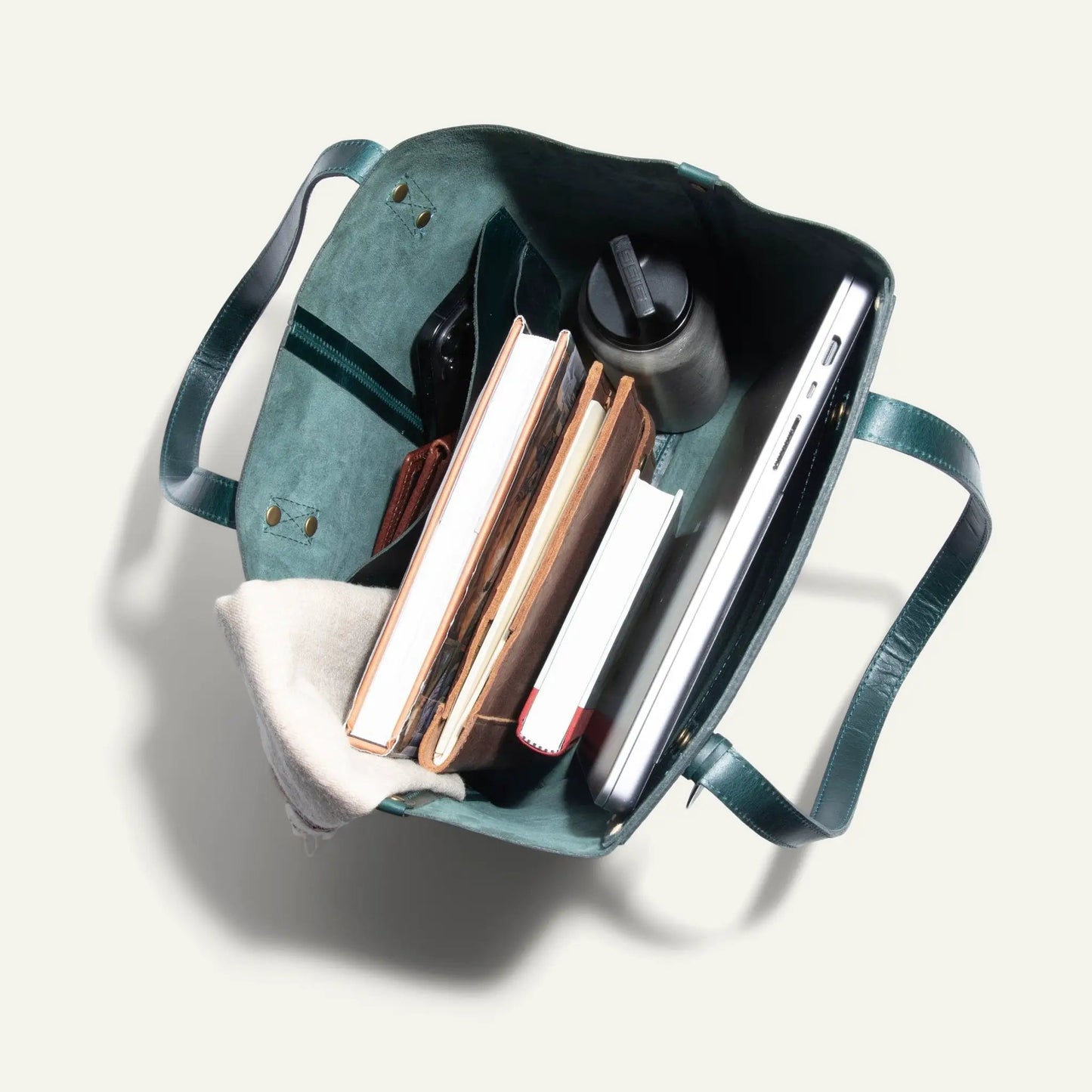 Simple Tote Full Grain Leather Handcrafted teal green tote bag with books and water bottle on Tampa Home & Garden Store