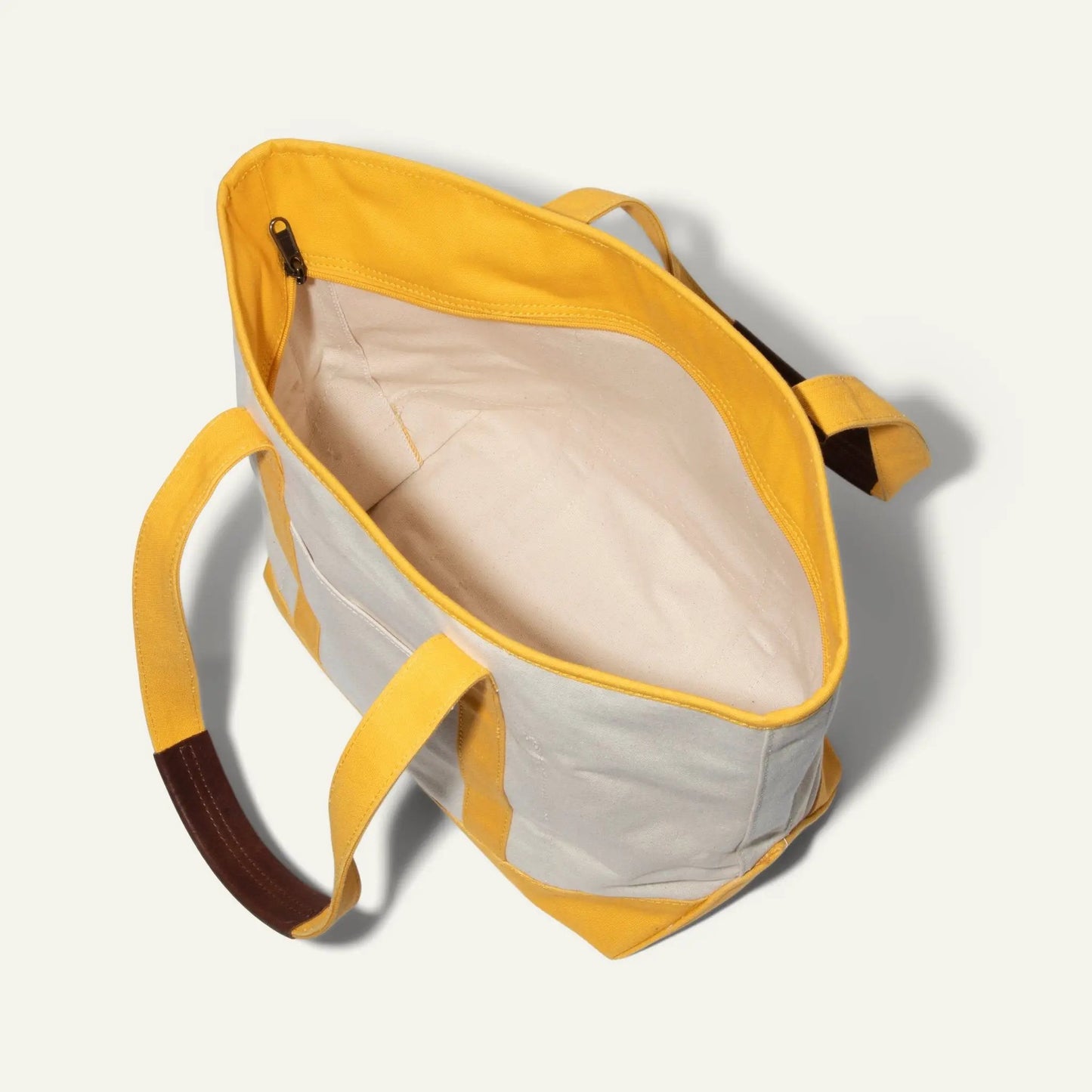 Driftwood Tote by Will Leather Goods; 18oz canvas, yellow with tan interior, zipper pocket on Tampa Home & Garden Store