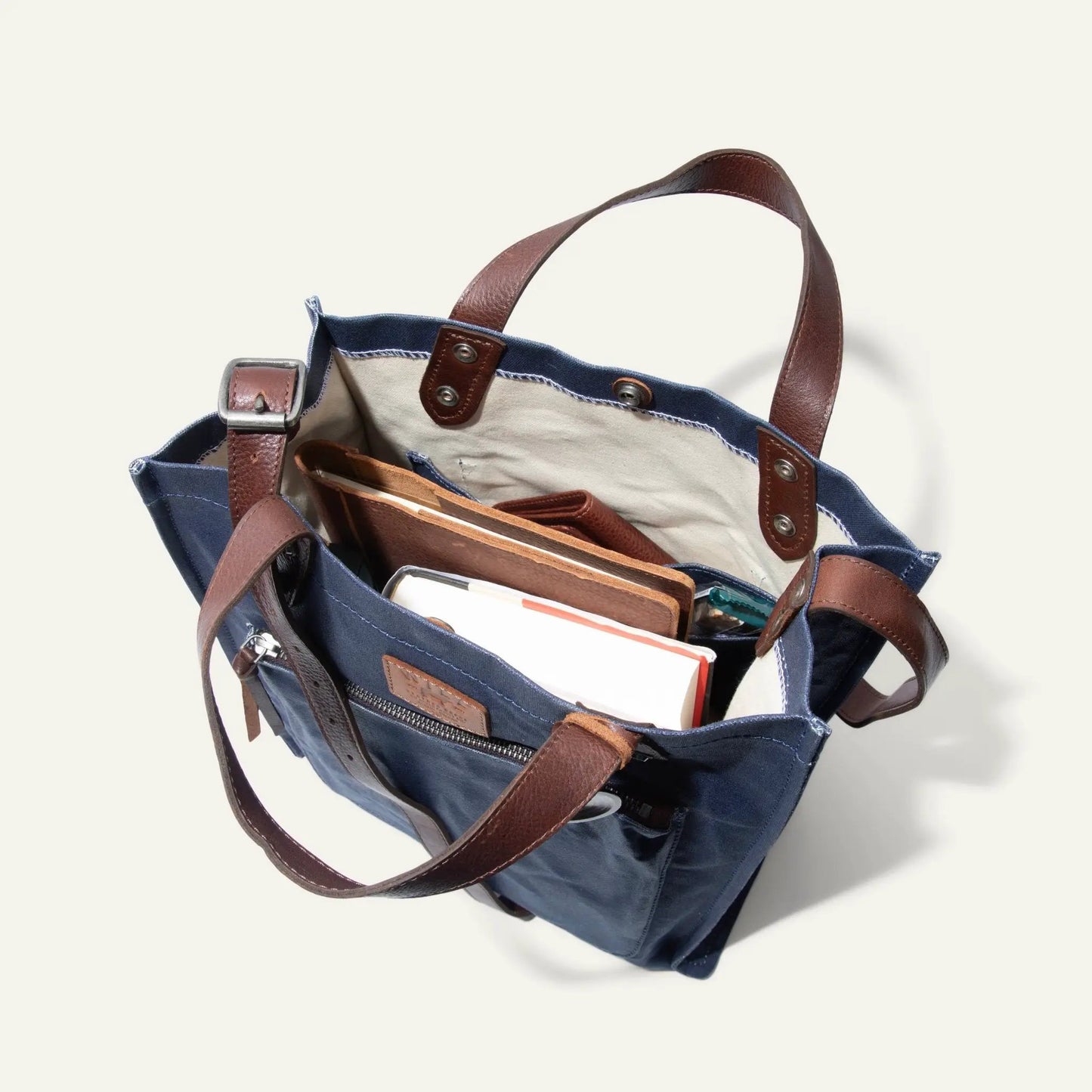 Rainline Market Tote by Will Leather Goods, denim tote with brown leather trim and straps on Tampa Home & Garden Store