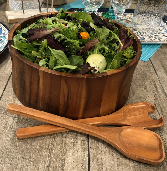 Kalmar Home Extra Large Acacia Wood Salad Bowl with Servers filled with leafy greens on Tampa Home & Garden Store