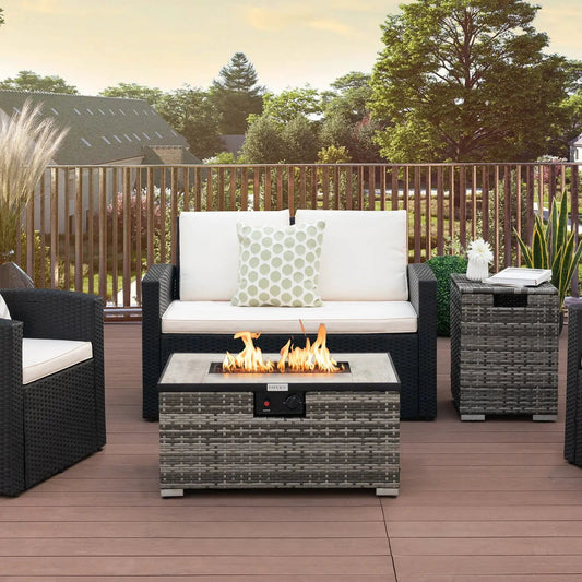 Propane rattan fire pit table set with side table in dark wicker and white cushions on deck on Tampa Home & Garden Store