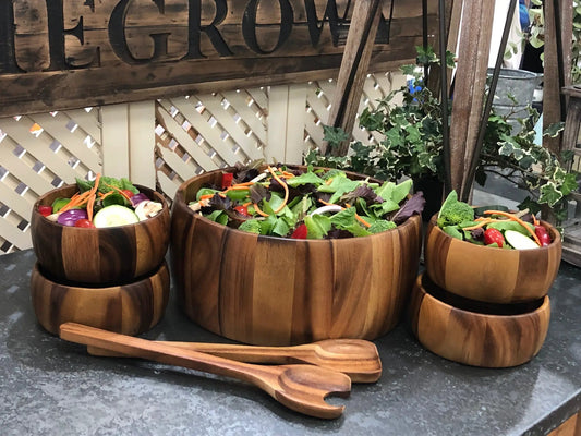 Large acacia wood salad bowl set with servers by Kalmar Home, wooden bowls filled with greens on Tampa Home & Garden Store