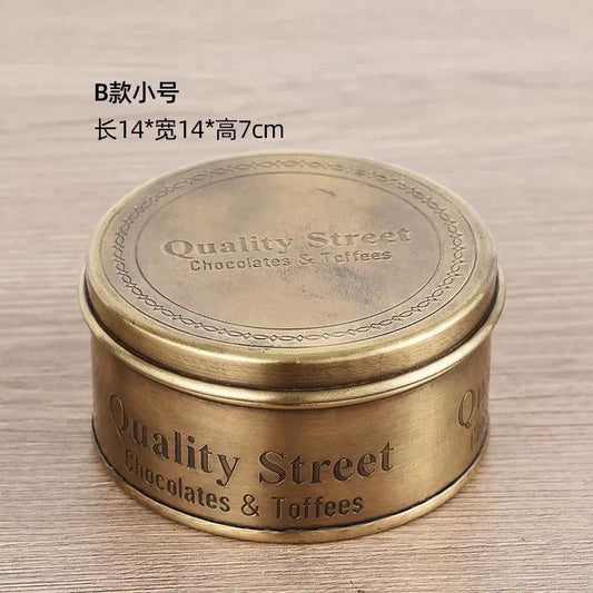 Brass storage tin with lid, embossed Quality Street Chocolates & Toffees, decorative jar on Tampa Home & Garden Store