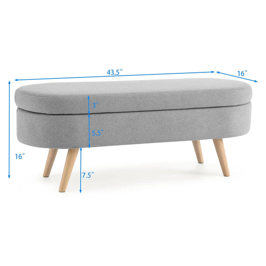 Oval grey linen storage ottoman with light wood legs 43.5 in long on Tampa Home & Garden Store