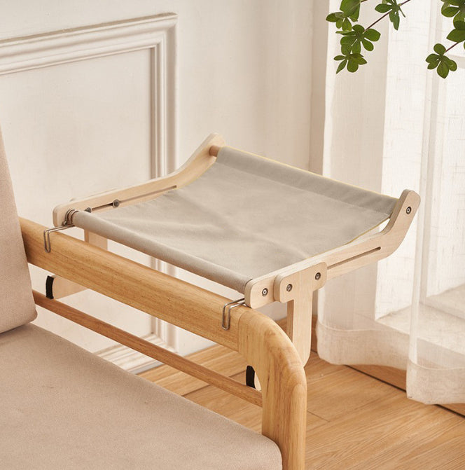 Cat hanging bed hammock with light wood frame and beige fabric over sofa by Sell My Stuff on Tampa Home & Garden Store