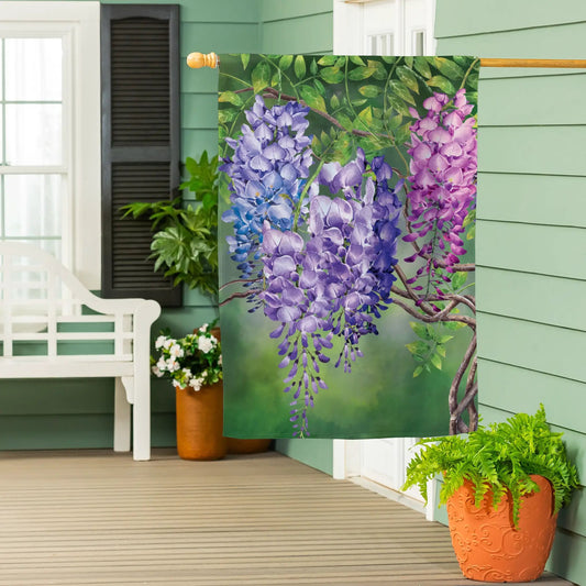 Colorful Wisteria Suede House Flag for Garden with purple blossoms and green backdrop on Tampa Home & Garden Store