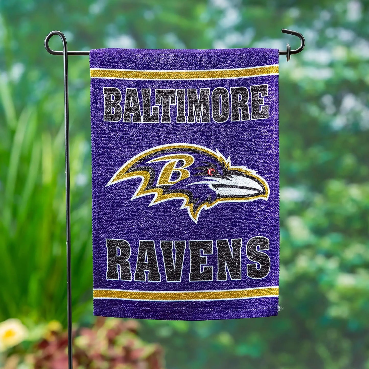Baltimore Ravens suede flag GDN size, purple with gold stripe and team logo on Tampa Home & Garden Store