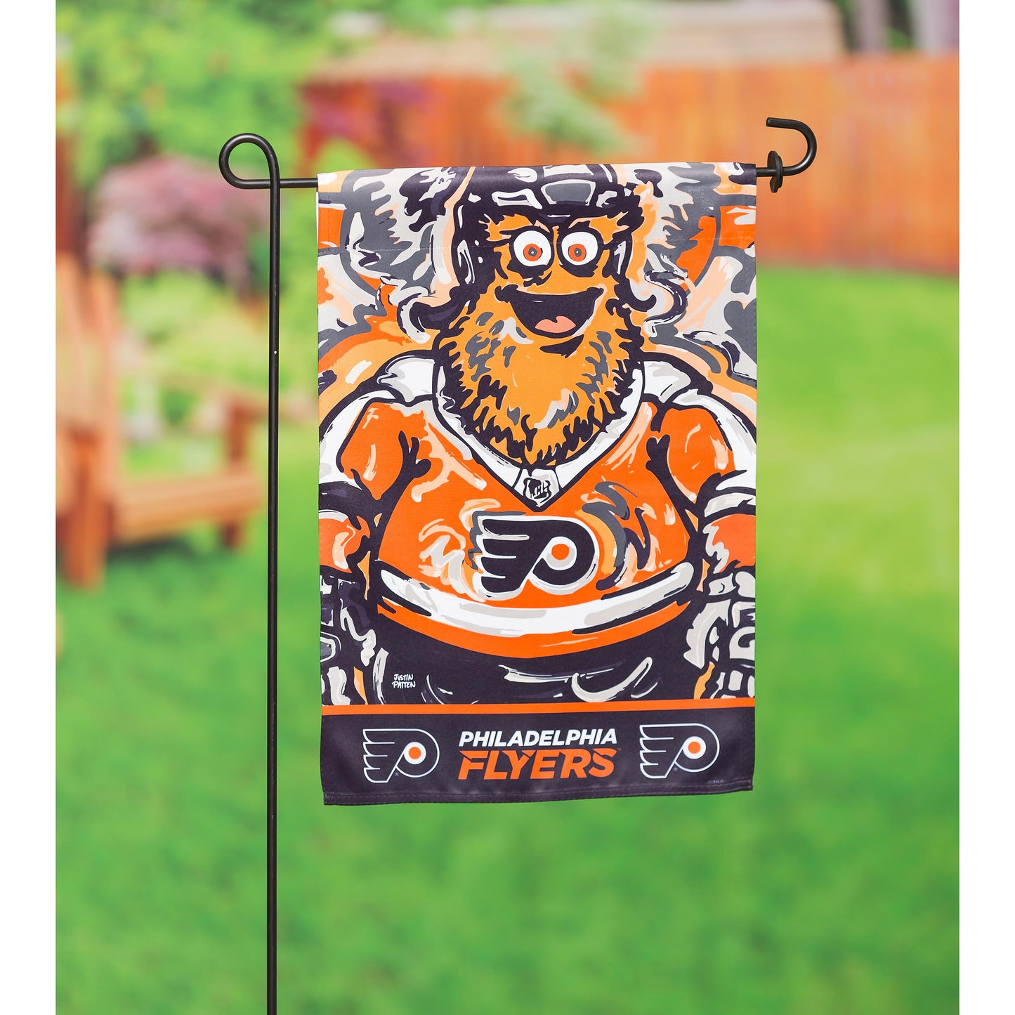 Philadelphia Flyers suede garden flag with orange and navy dog graphic on a metal stand on Tampa Home & Garden Store