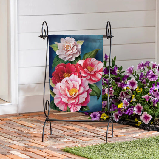 Multicolor Camellias Suede Garden Flag featuring large pink blooms on blue background on Tampa Home & Garden Store