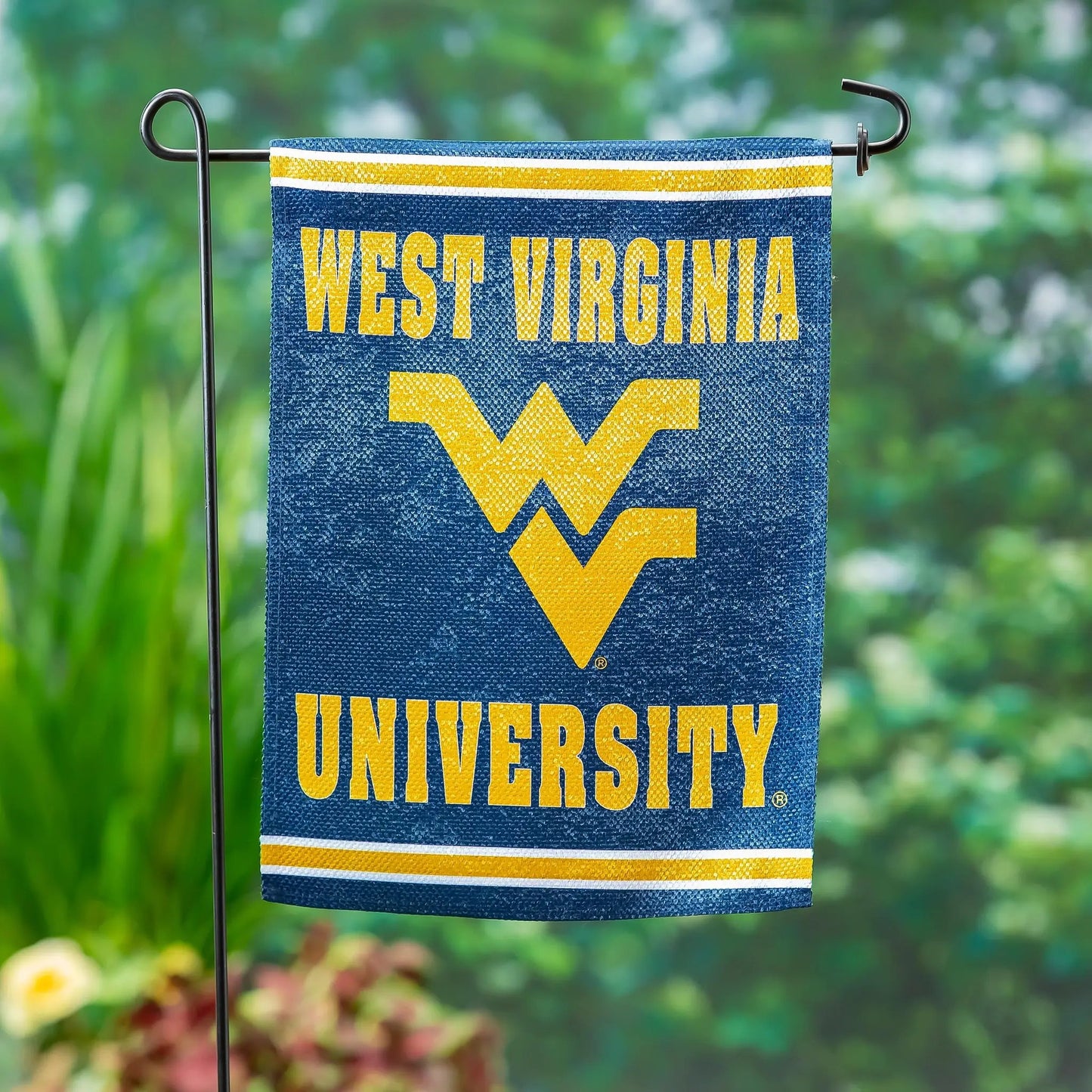 West Virginia University double-sided suede flag blue with gold WV letters and stripes on Tampa Home & Garden Store