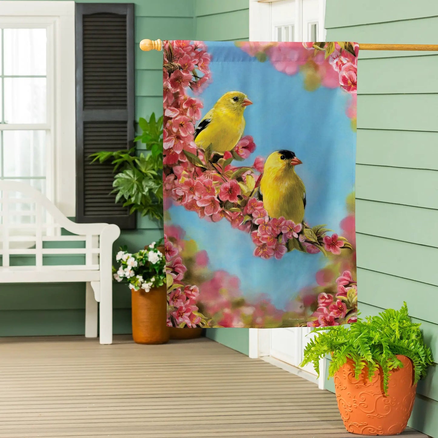 Goldfinch Quartet suede house flag with pink blossoms and yellow finches on blue background on Tampa Home & Garden Store