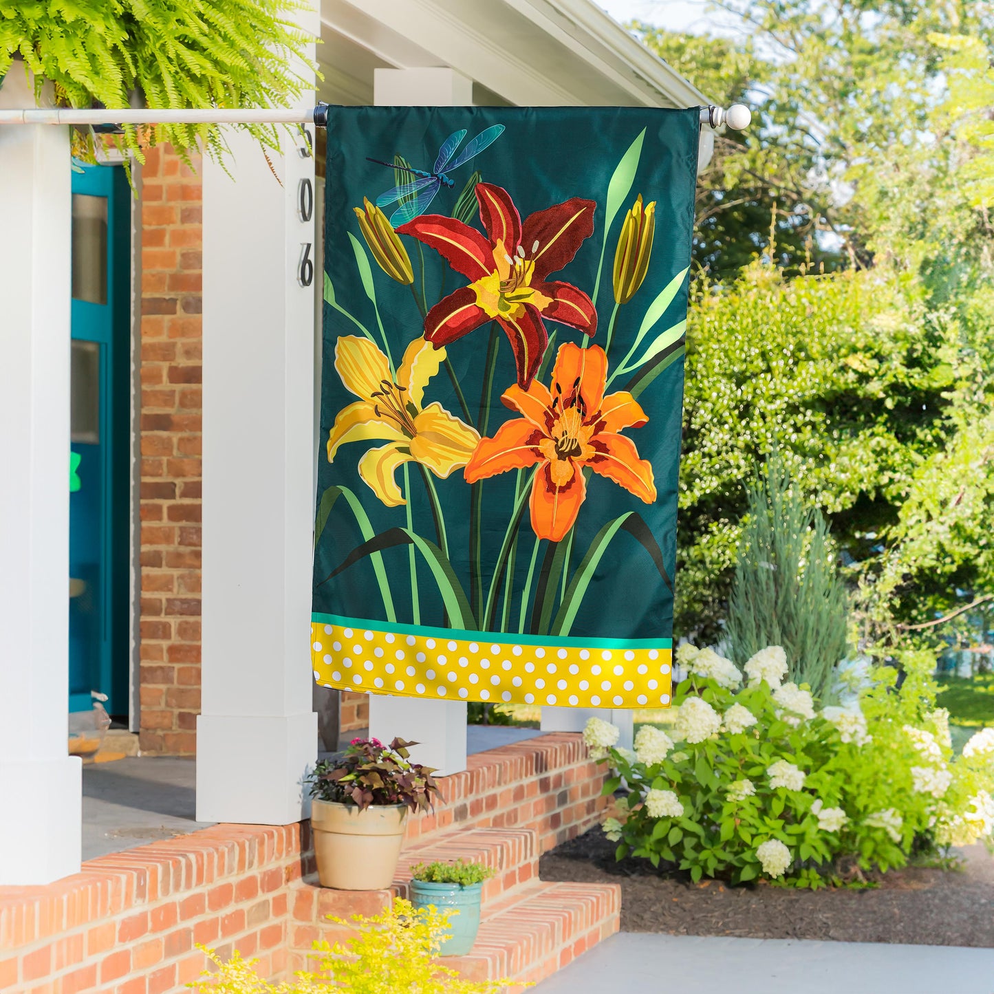 Daylilies Applique House Flag teal backdrop with orange lilies and green leaves for outdoor porch on Tampa Home & Garden Store