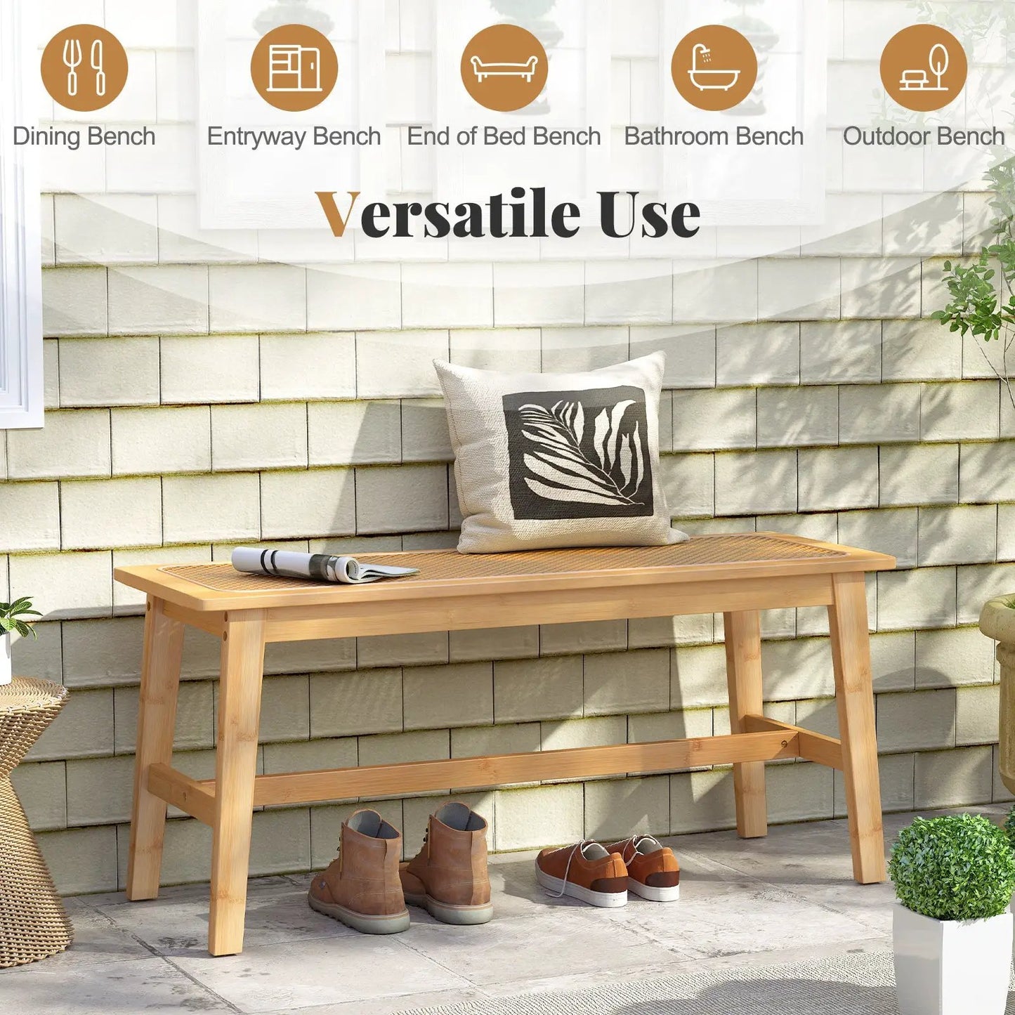 Bamboo dining bench with handwoven rattan seat in natural finish, outdoor patio with leaf-pattern cushion on Tampa Home & Garden Store