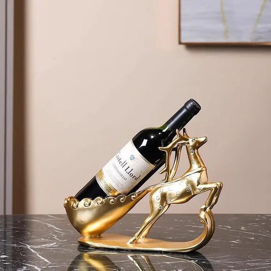 Golden Deer wine rack decor gold-tone metal sculpture cradling a wine bottle on Tampa Home & Garden Store