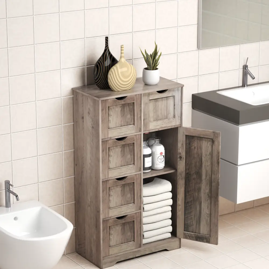 Grey bathroom storage cabinet with 5 drawers and a single door, rustic wood grain finish with towels inside on Tampa Home & Garden Store
