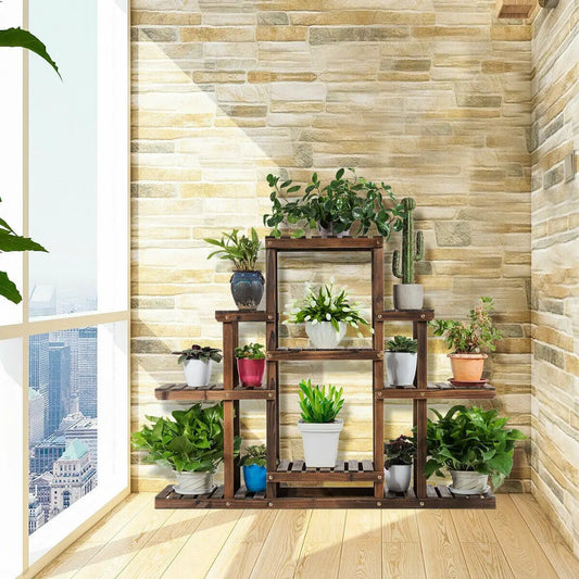Six-tier wooden plant stand for display and storage with assorted potted plants on Tampa Home & Garden Store