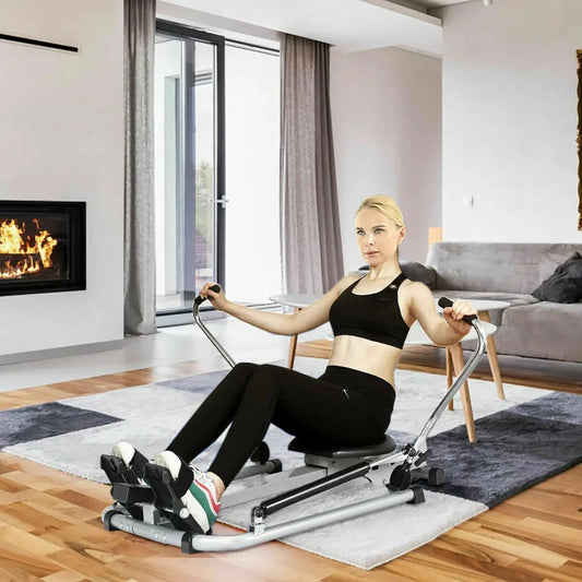 DirectDeals adjustable hydraulic rowing machine with silver frame and black seat at home on Tampa Home & Garden Store