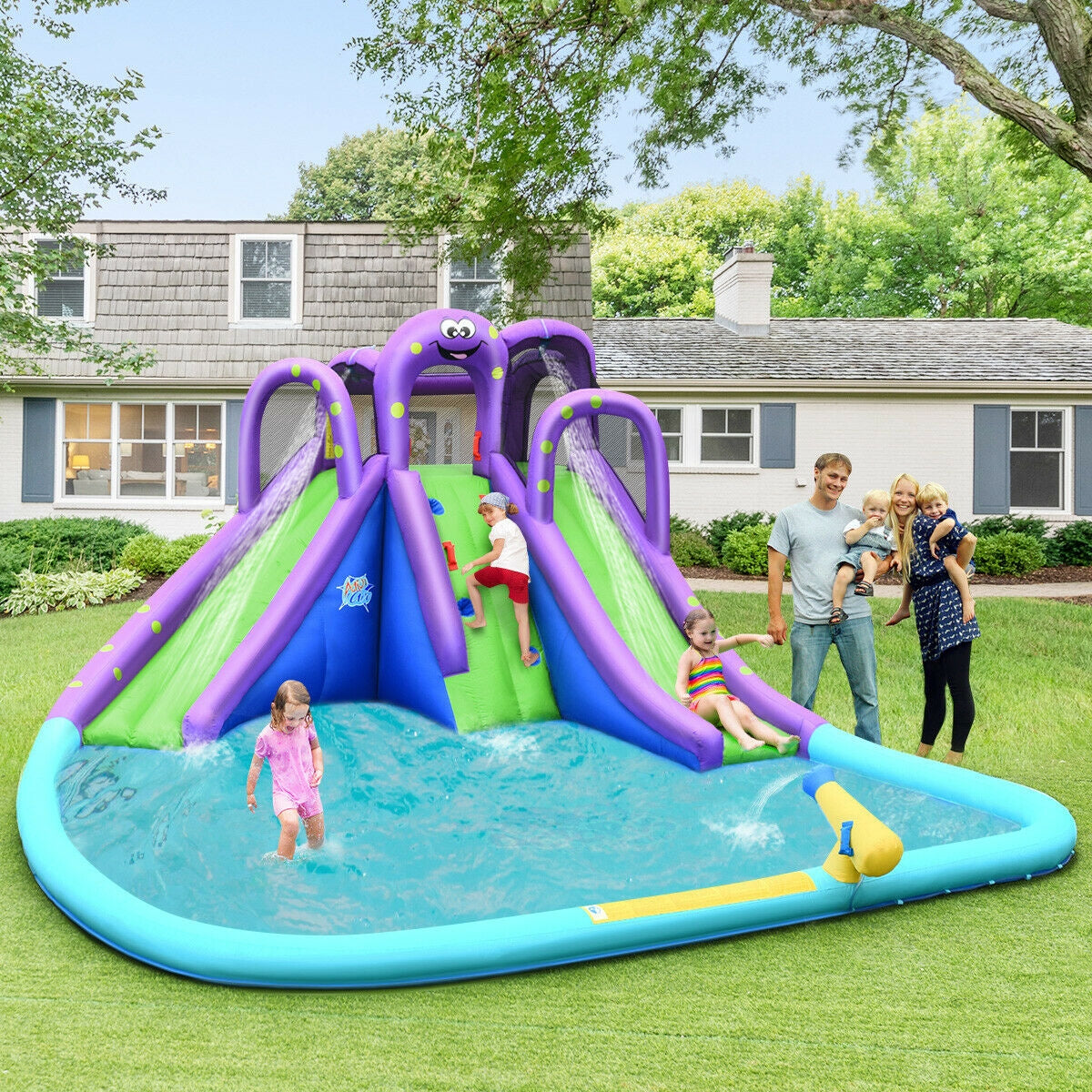 Inflatable Water Park Mighty Bounce House Pool with purple and green slides in backyard on Tampa Home & Garden Store
