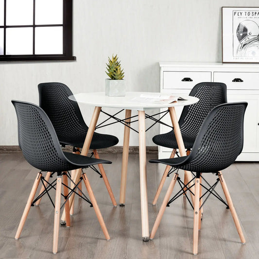 4 Piece Plastic Hollow Chair Set With Wood Leg DirectDeals, black chairs with wood legs around a white dining table on Tampa Home & Garden Store